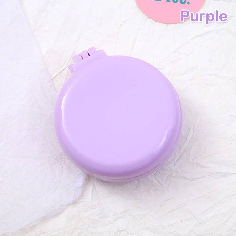 GoCute Mini Folding Hair Comb with Mirror – Portable Styling Tool for Travel & Everyday Use