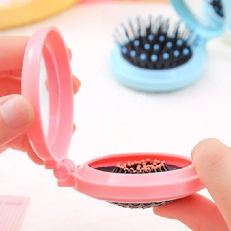 GoCute Mini Folding Hair Comb with Mirror – Portable Styling Tool for Travel & Everyday Use