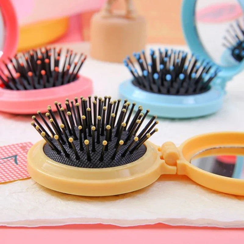 GoCute Mini Folding Hair Comb with Mirror – Portable Styling Tool for Travel & Everyday Use